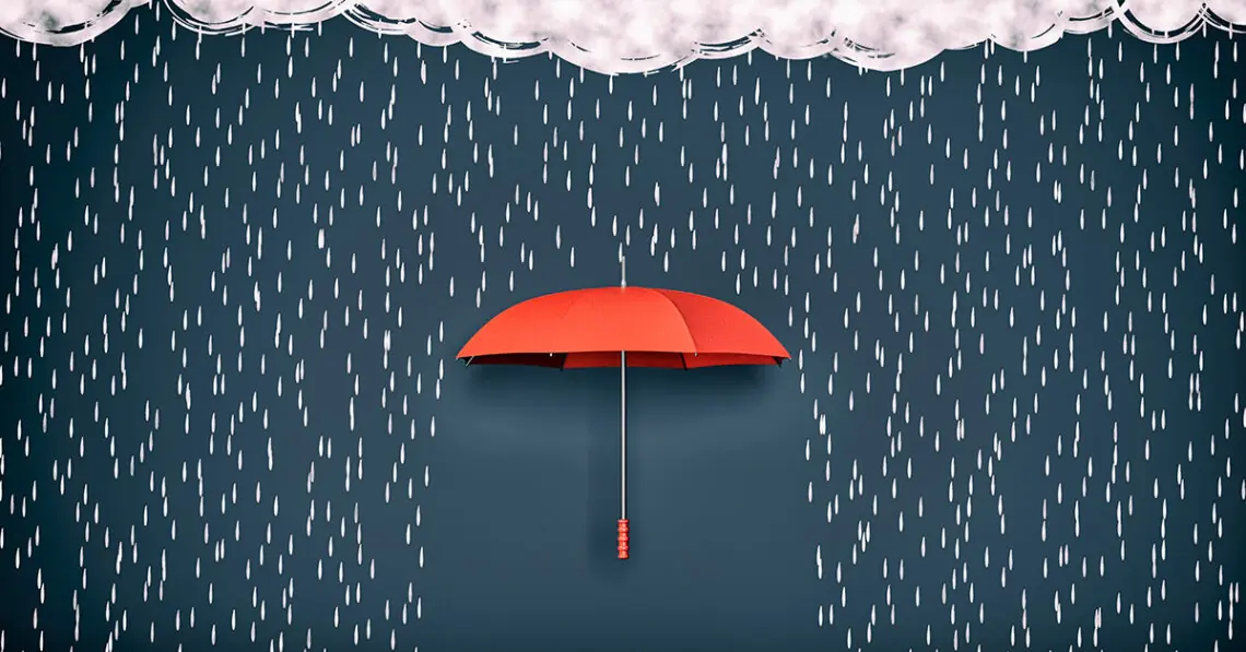 red umbrella blocking rain