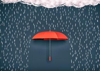 red umbrella blocking rain