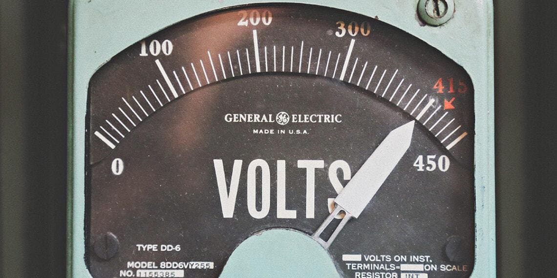 Voltmeter pointing to high voltage