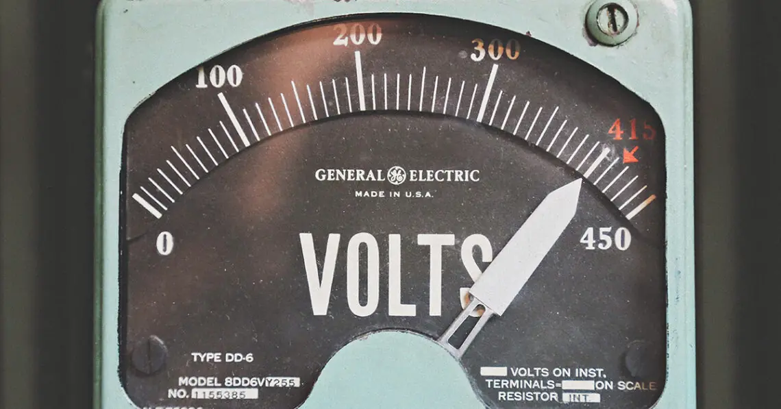Voltmeter pointing to high voltage
