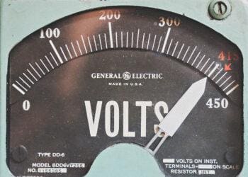 Voltmeter pointing to high voltage
