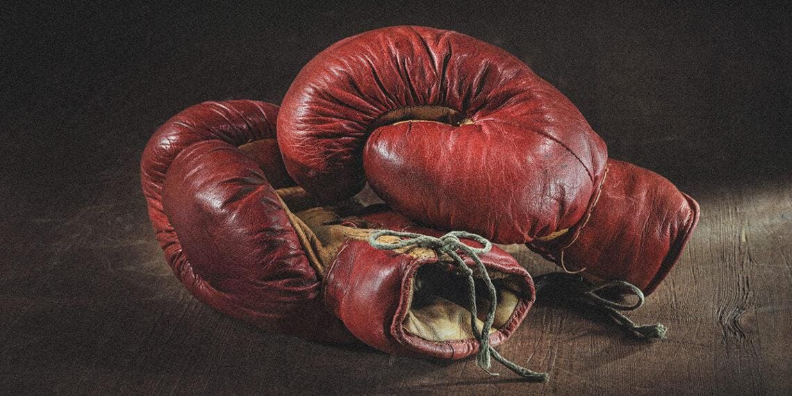 A pair of old boxing gloves