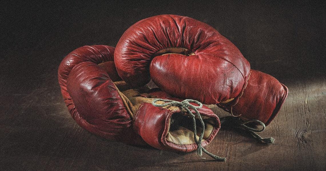 A pair of old boxing gloves