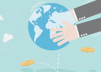 shaking money from the globe