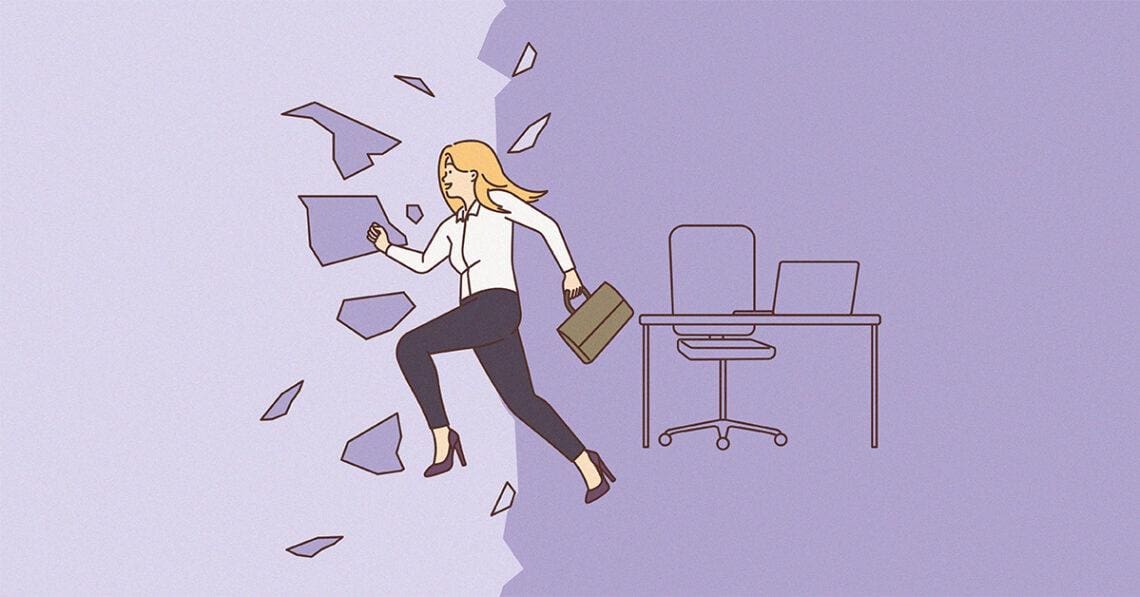 A woman breaks through glass