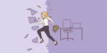 A woman breaks through glass