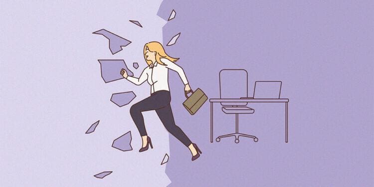 A woman breaks through glass