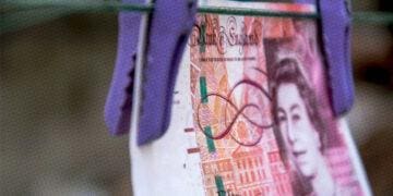 british bank note on clothesline