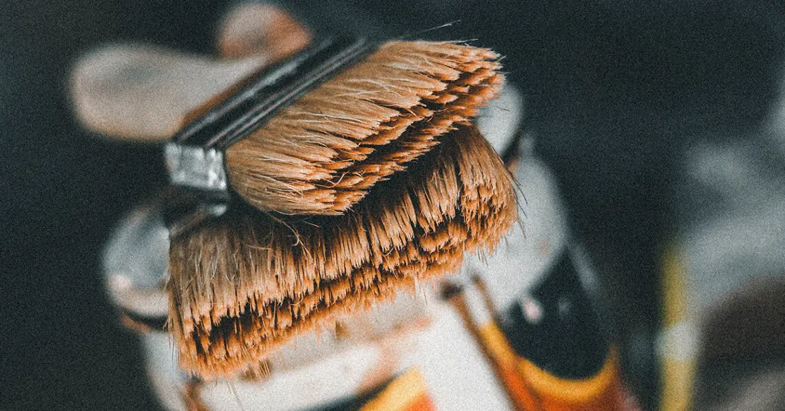 brushes stacked on paint can