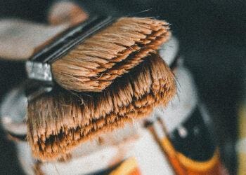 brushes stacked on paint can