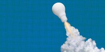 conceptual art representing startups with lightbulb and clouds