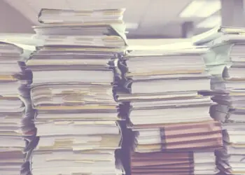 papers stacked up in office
