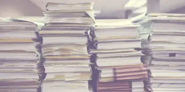 papers stacked up in office
