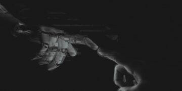 human and robot finger touching