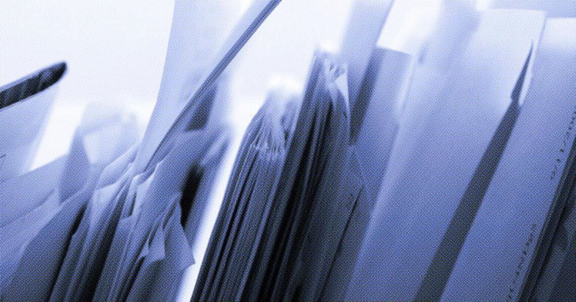 papers lined up in folders