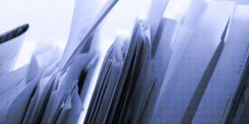 papers lined up in folders