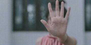 woman making stop gesture