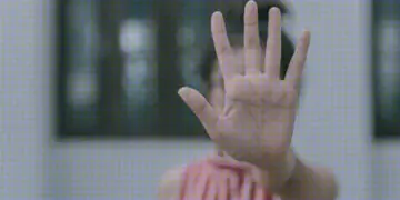 woman making stop gesture