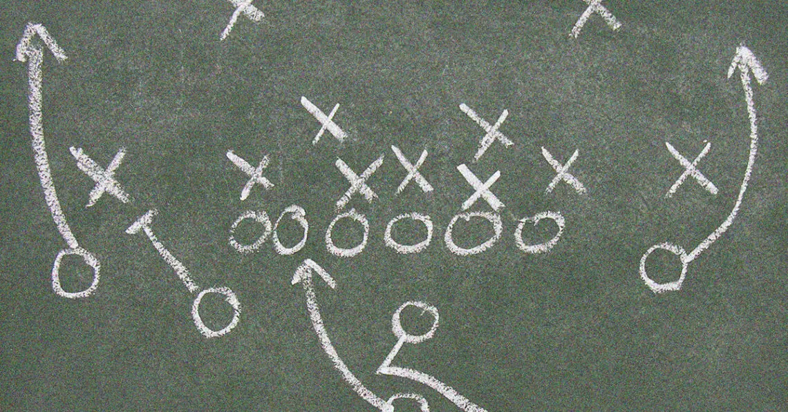 football play drawn up on chalkboard