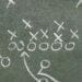 football play drawn up on chalkboard