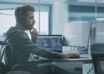 disabled worker at computer desk