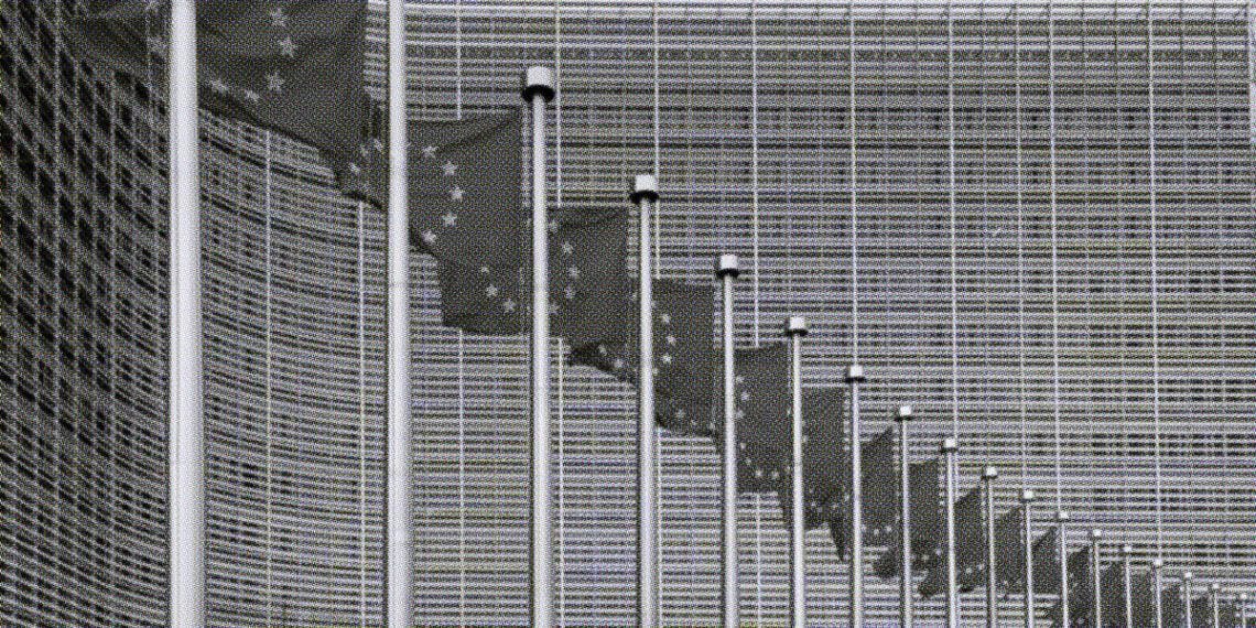 european union flags outside headquarters