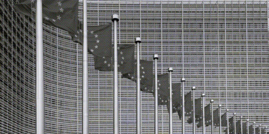european union flags outside headquarters