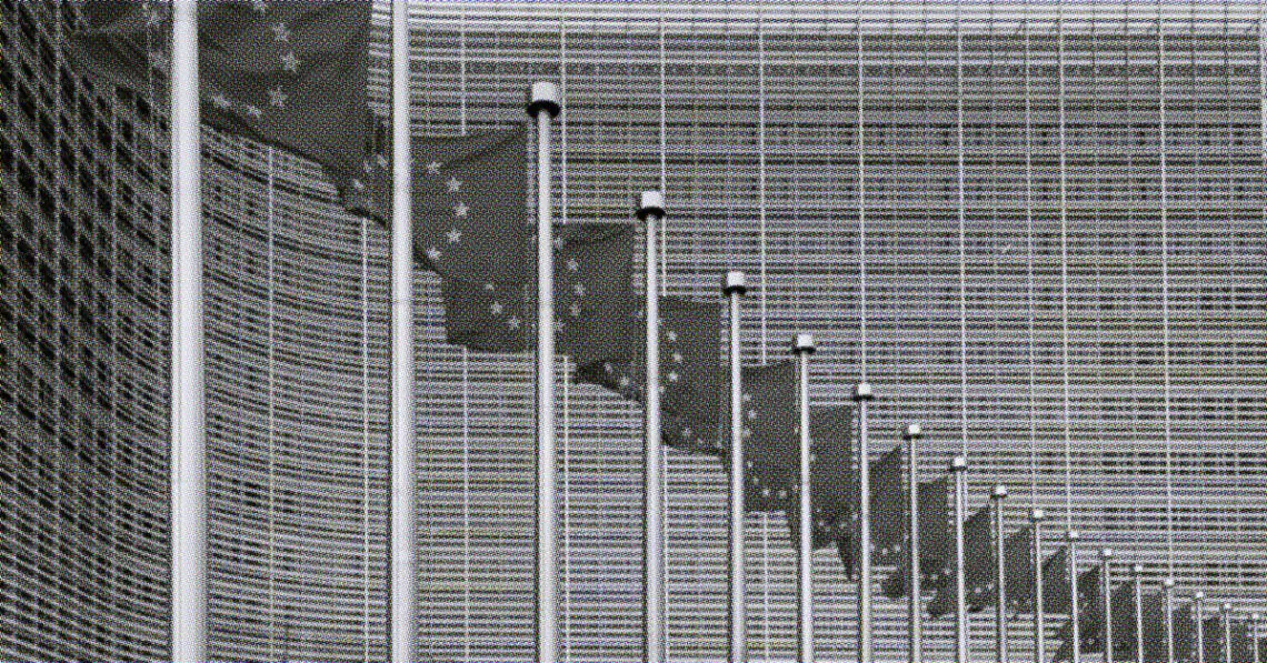 european union flags outside headquarters