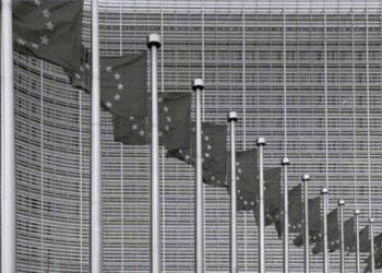 european union flags outside headquarters