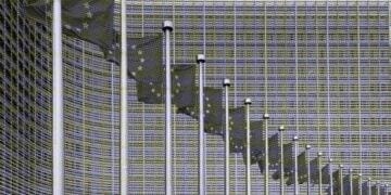 european union flags outside headquarters