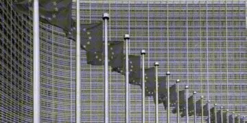 european union flags outside headquarters