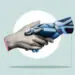 robot and human hand joining forces