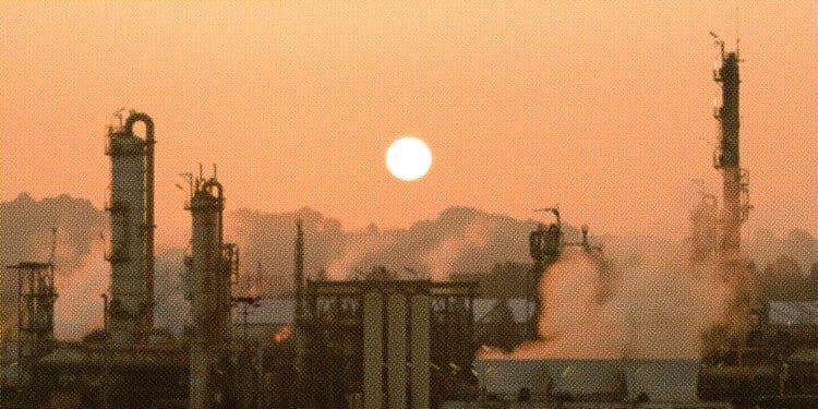 pollution against sunset sky