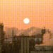 pollution against sunset sky