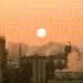 pollution against sunset sky