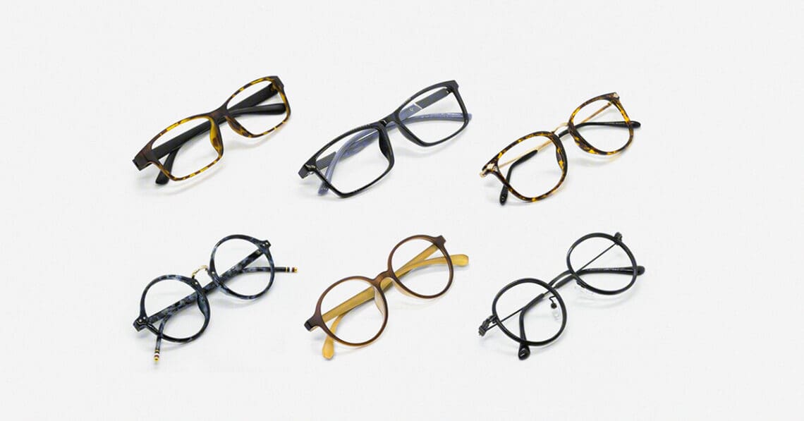 six pairs of eyeglasses lined up