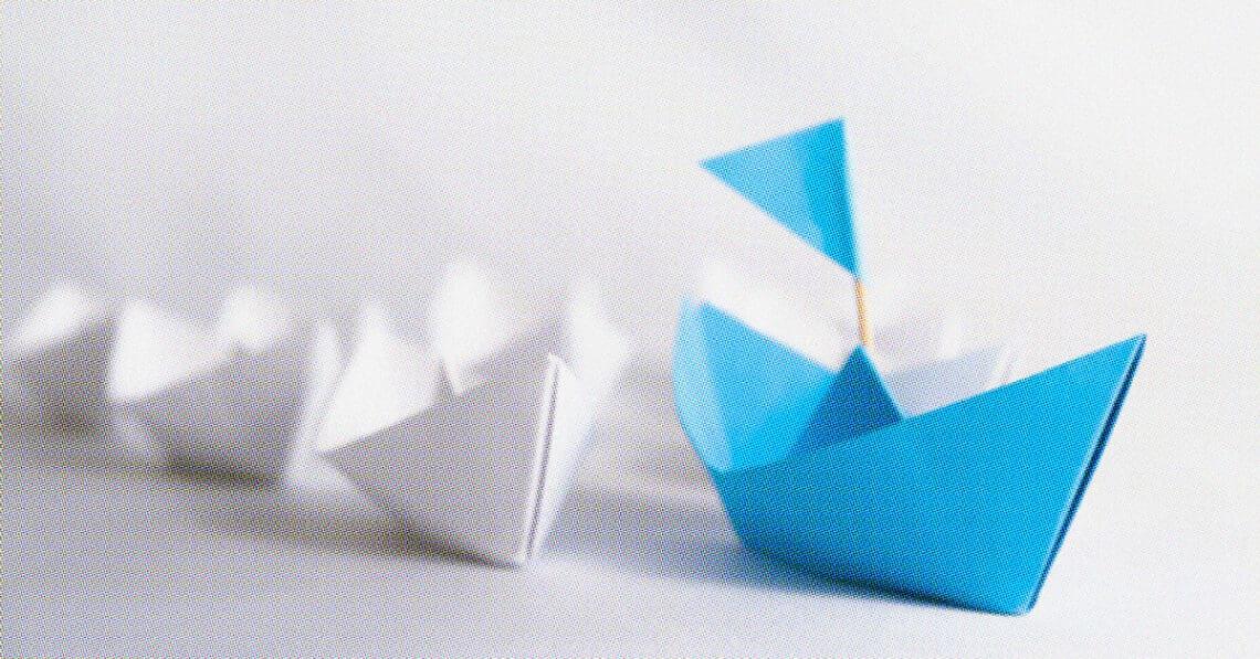 paper boats following the leader