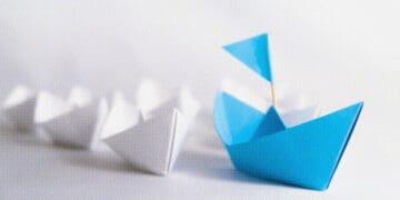 paper boats following the leader
