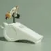 corporate whistleblower figurines