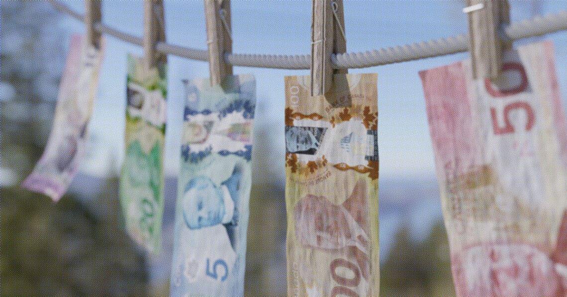 international currency on clothesline