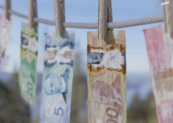 international currency on clothesline