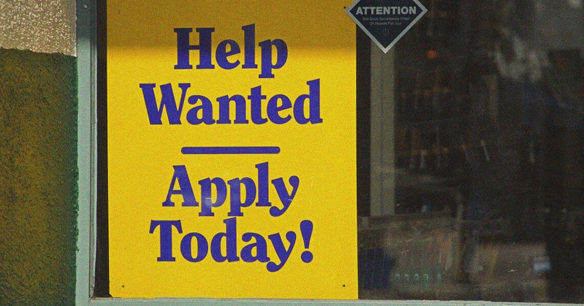 help wanted sign in business window