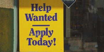 help wanted sign in business window