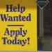help wanted sign in business window