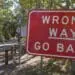 wrong way sign on road