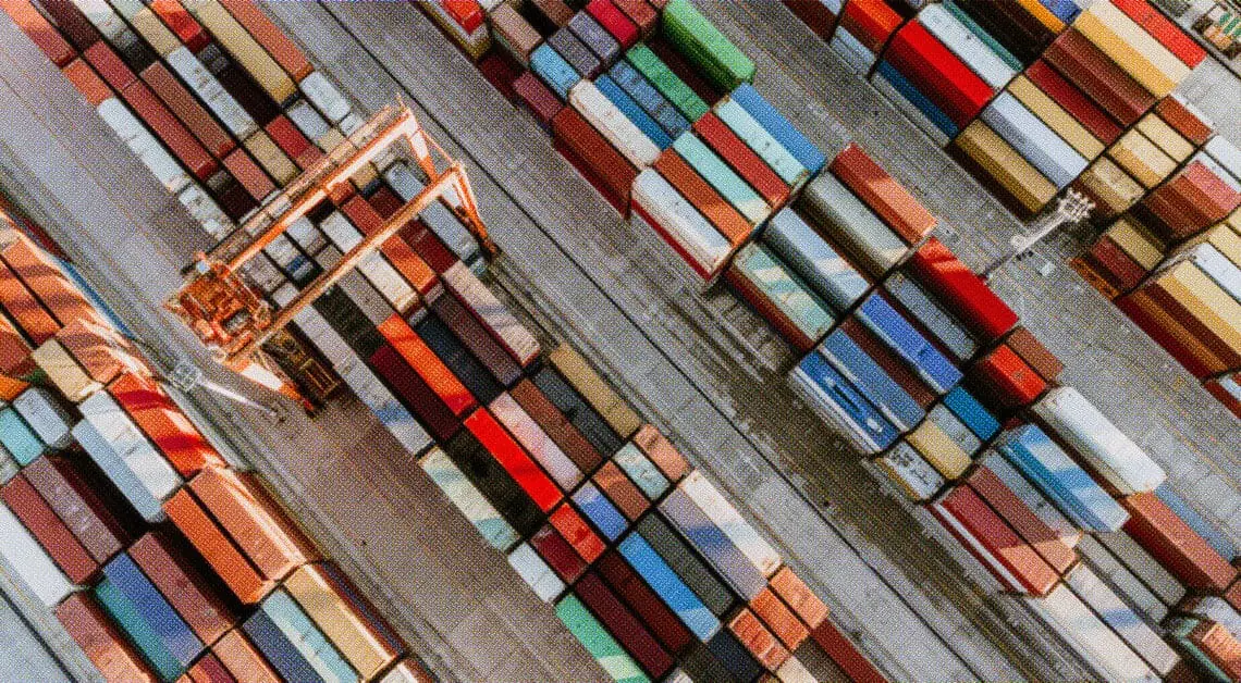 rows of shipping containers aerial view