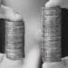 hands with two stacks of coins