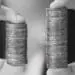 hands with two stacks of coins
