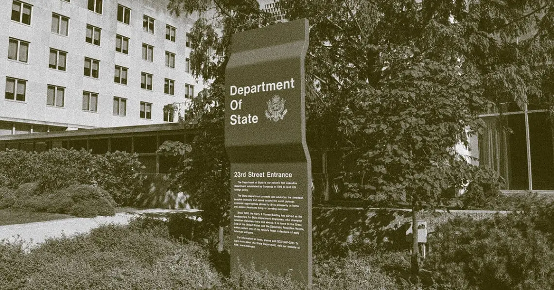 sign in front of state department building