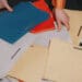 office worker picking up file folders